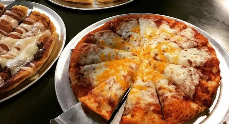 Slices of Pizza being served