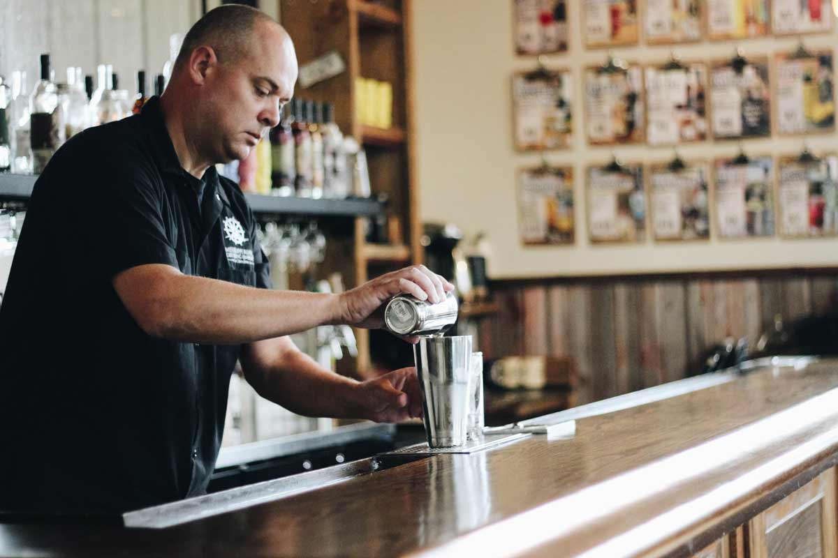 bartender mixing a drink